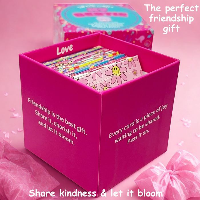 The gift box open, filled with folded cards